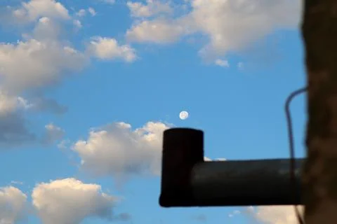 The moon rising from the chimney Stock Photos