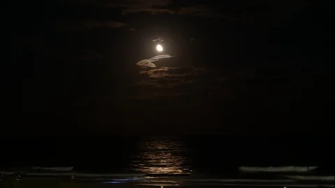 Moon rising over ocean waves at beach time lapse Stock Footage 95982225