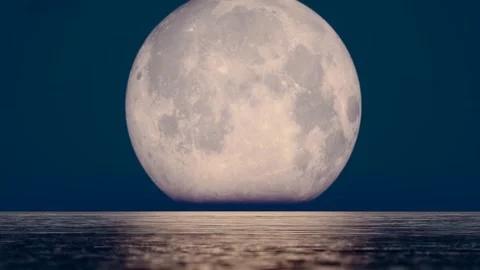 The moon rising over the sea during the Mid-Autumn Festival on August 15th Stock Footage 253358623