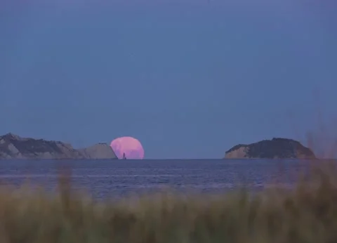 Moon Rising over Sponge Bay Cliffs Stock Footage 130476196