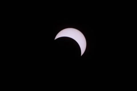 The Moon is seen passing in front of the Sun during a total solar eclipse ... Fotos Stock