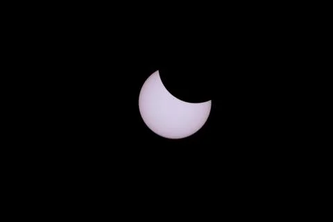 The Moon is seen passing in front of the Sun during a total solar eclipse o.. Fotos Stock
