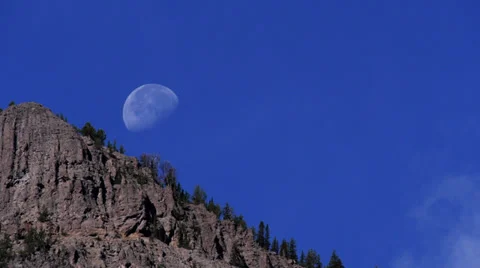 Moon Setting over Baronette Peak in Yellowstone National Park Stock Footage 32175989