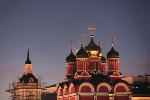 Moon setting over the domes of the Orthodox Church in Moscow Stock Photos