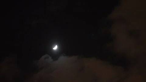 Moon shining clouds night sky. Cinematic moody lighting atmospheric night scene Stock Footage 331677501