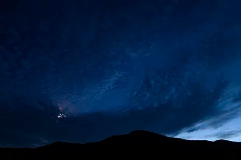 Moon shining through clouds over Mount Washington, New Hampshire. Fotos Stock
