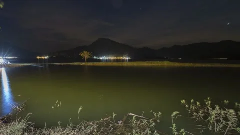 A moon is on sky with cloudy reflection on water Stock Footage 266147191