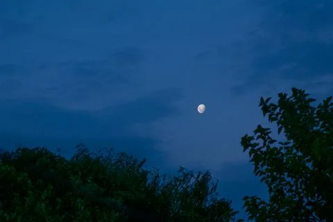 The moon in the sky , at night Stock Photos
