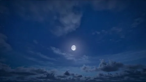 The moon on the starry sky with clouds moving at night Stock Footage 243583204