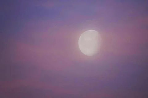The moon at sunrise Stock Photos