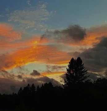 Moon in the sunset Stock Photos