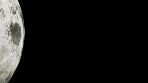 Moon surface details are visible during a clear night sky Stock Footage 344852893