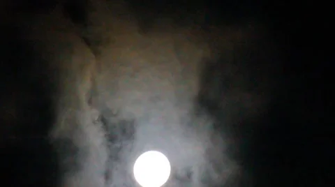 Moon through the clouds Stock Footage 8769370