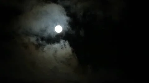 Moon through clouds Stock Footage 10575097