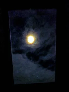 Moon through a window halo Stock Photos