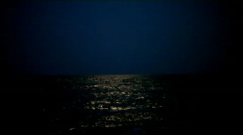 Moon under ocean Stock Footage