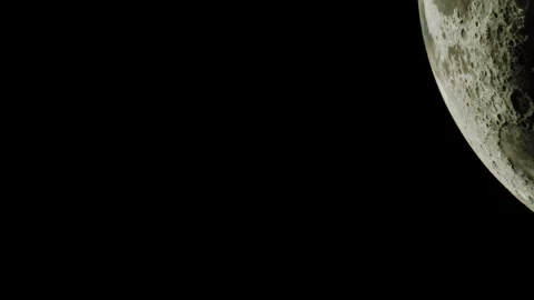 Moon visible in clear night sky with details of surface features Stock Footage 345054554