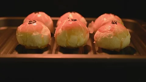 Mooncake Pastry Baking in a Hot Oven for Mid Autumn Festival Vídeos de archivo 345668690