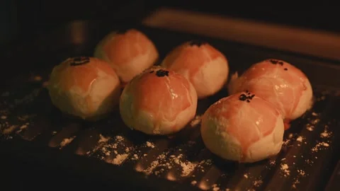 Mooncake Pastry Baking in a Hot Oven for Mid Autumn Festival Vídeos de archivo 345668729