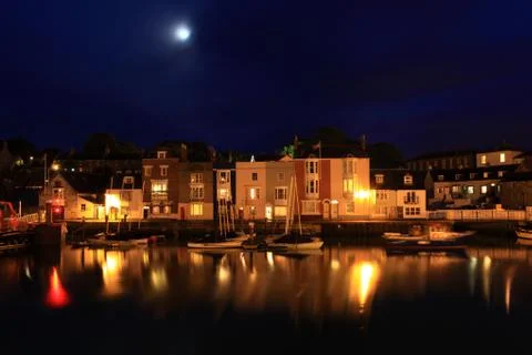 Moonlight harbour Stock Photos