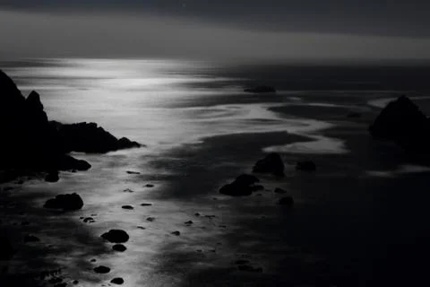 Moonlight over the pacific Stock Photos