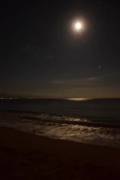 Moonlight Over Waves 写真素材