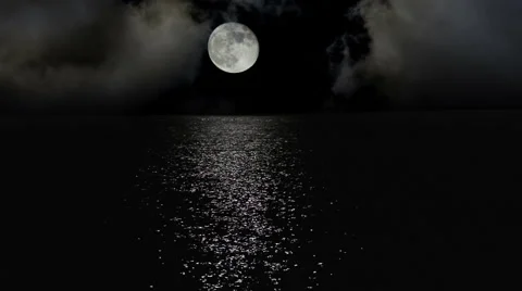 Moonlight path with low fool moon above the sea Stock Footage 55706669