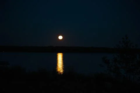 Moonlight path on the water Stock Photos