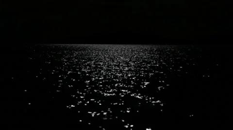 Moonlight reflecting from nightly lake Video stock 54563140
