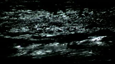 	Moonlight Reflecting on Rolling Ocean Waves 2 Stock Footage 131899