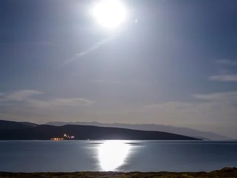 Moonlight reflection in the surface of the sea in Krk, Croatia. Calm and dark Stock Photos