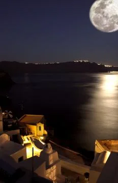 Moonlight in santorini Stock Photos