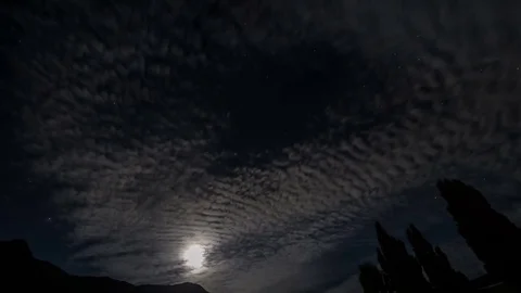 Moonlight timelapse with fast clouds and night sky Stock Footage 70608731