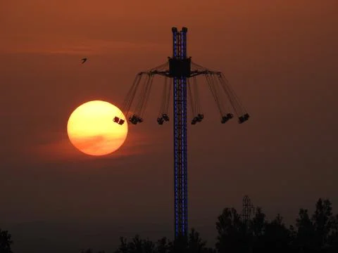 Moonlit fairground ride Stock Photos