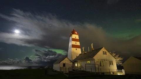 Moonlit night at the lighthouse Stock Footage 250759257