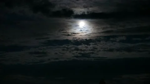 Moonlit night, moon with clouds in a dark sky - timelapse  動画素材 54220691