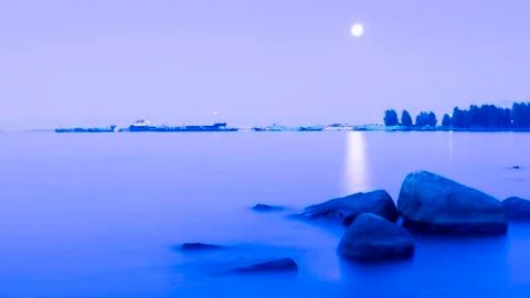 Moonlit path on the lake surface 스톡 사진