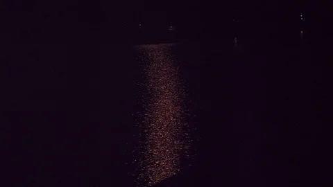 Moonlit path to the sea on a dark night. Sea night landscape with the moon Stock Footage 124703556