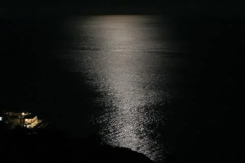 Moonlit path in the sea. 库存照片