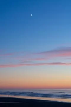 Moonlit sunset Stock Photos