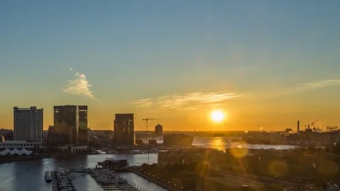 Moonrise and Sunrise Over Baltimore Harbor Timelapse Stock Footage