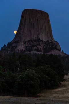 Moonrise Going Behind Devils Tower, Devils Tower National Monument, Wyoming Stock Photos