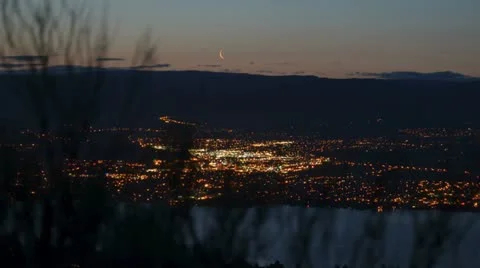 Moonrise motion time lapse over Kelowna Stock Footage