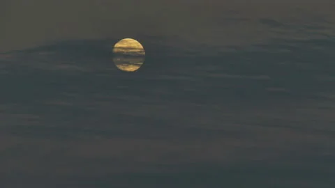 Moonrise over the horizon with clouds Stock Footage 236725886