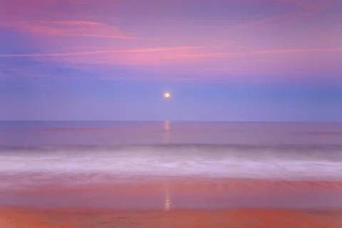 Moonrise  Over the Ocean Stock Photos