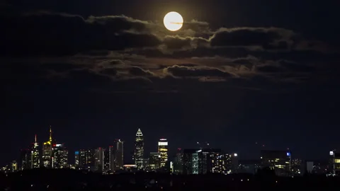 Moonrise over skyline Stock Footage 205022357