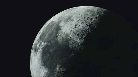 Moons enchanting surface reveals craters and shadows in celestial glow Vídeos de archivo 340666628
