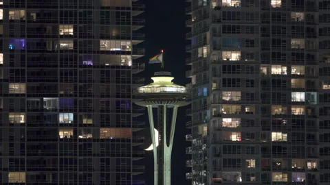 Moonset Behind the Space Needle with Progress Pride Flag Displayed Stock Footage 312374260