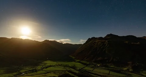 Moonset over mountains Stock Footage 123988383