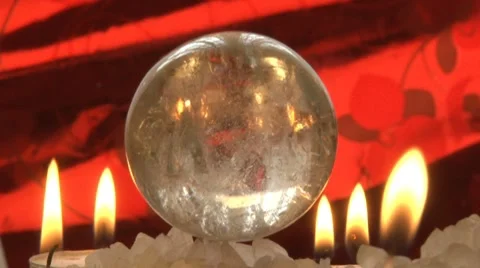 Moonstone ball and candles Stock Footage